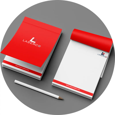 Red and white branded notepads with a pencil.