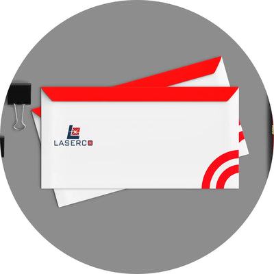 Business cards with a red and white design featuring a laser company logo.